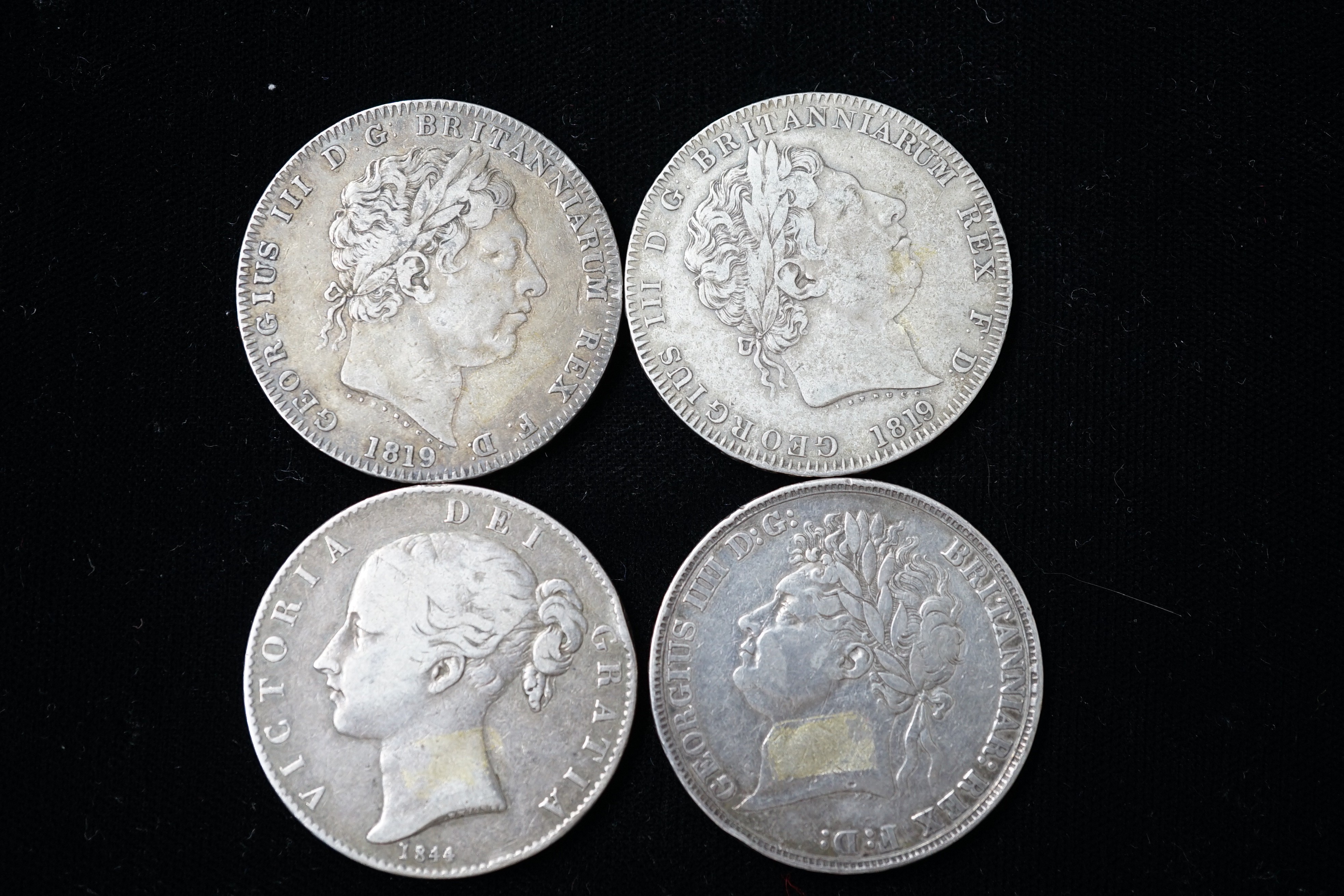 Three Georgian crowns, two 1819, F/VF, 1821, VG and a Victoria crown 1845, VG